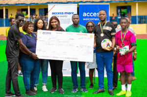 Staff of Access Bank (Ghana) PLC donating sporting essentials to Ada Kyeremateng A&B Basic Schools